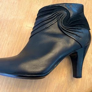 Beautiful 3” heeled leather black boots with exquisite suede swirl detail.